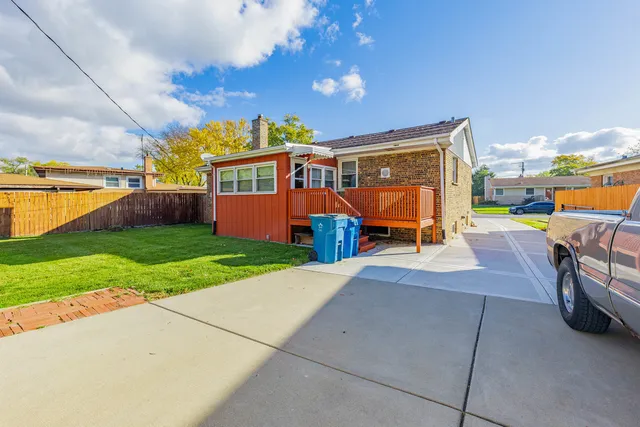 aerial view of a house with a garden