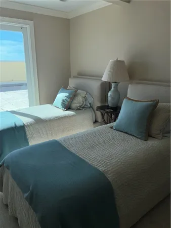 a bed room with a bed with wooden floor