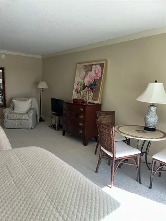 a bedroom with a workspace