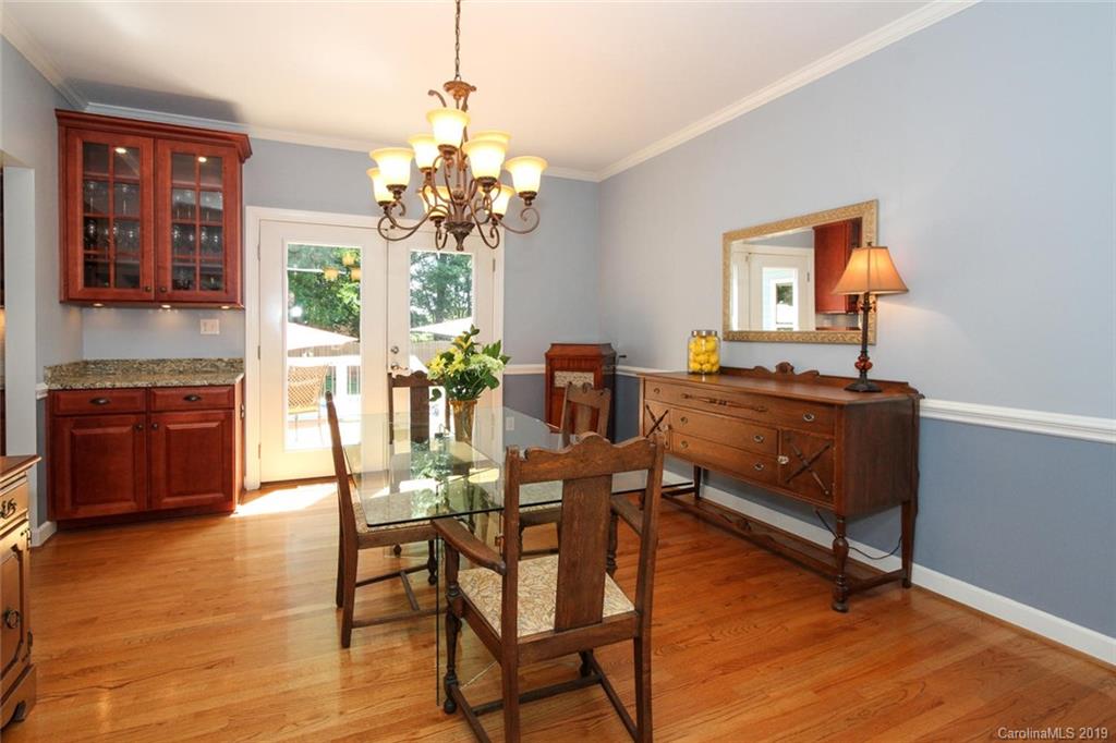 3375 Blue Jay Pass, Unit 10 Fort Mill, SC 29708 - Photo 4 of 30 a view of a dining room with furniture and chandelier