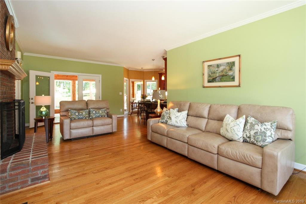 3375 Blue Jay Pass, Unit 10 Fort Mill, SC 29708 - Photo 5 of 30 a living room with furniture and a wooden floor