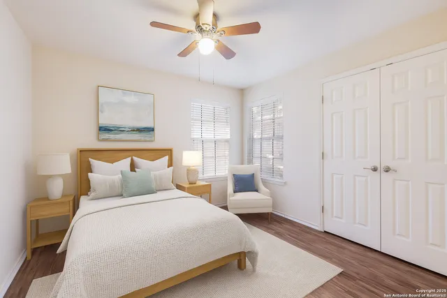 a bedroom with bed and window