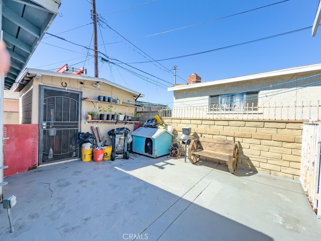 7850 Birchcrest Road Downey, CA 90240 - Photo 15 of 18 a view of a porch with wooden furniture