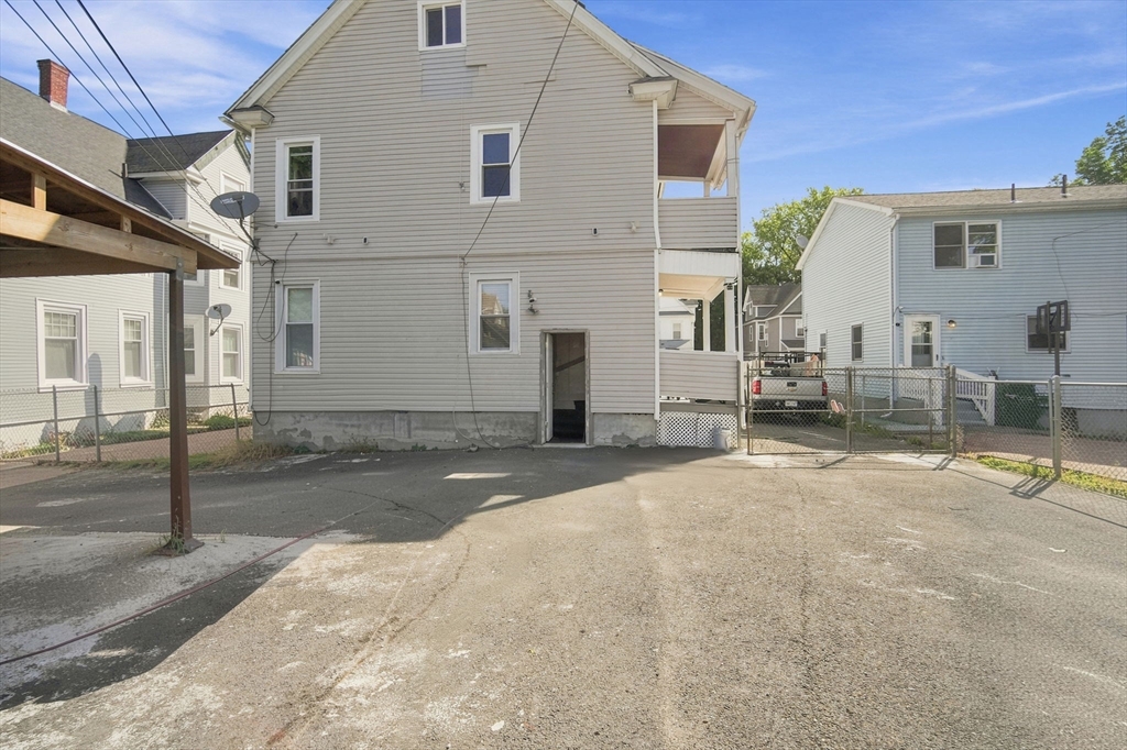 102-104 Cambridge Street Springfield, MA 01109 - Photo 36 of 38 a view of a house with backyard