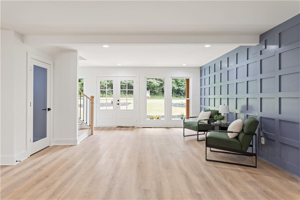 399 Old Canton Road Marietta, GA 30068 - Photo 12 of 26 a living room with furniture and large windows