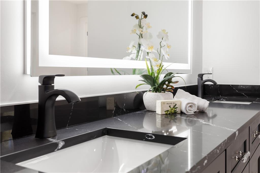 399 Old Canton Road Marietta, GA 30068 - Photo 17 of 26 a close view of dining table with potted plant