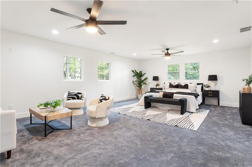 399 Old Canton Road Marietta, GA 30068 - Photo 19 of 26 a living room with furniture and a ceiling fan