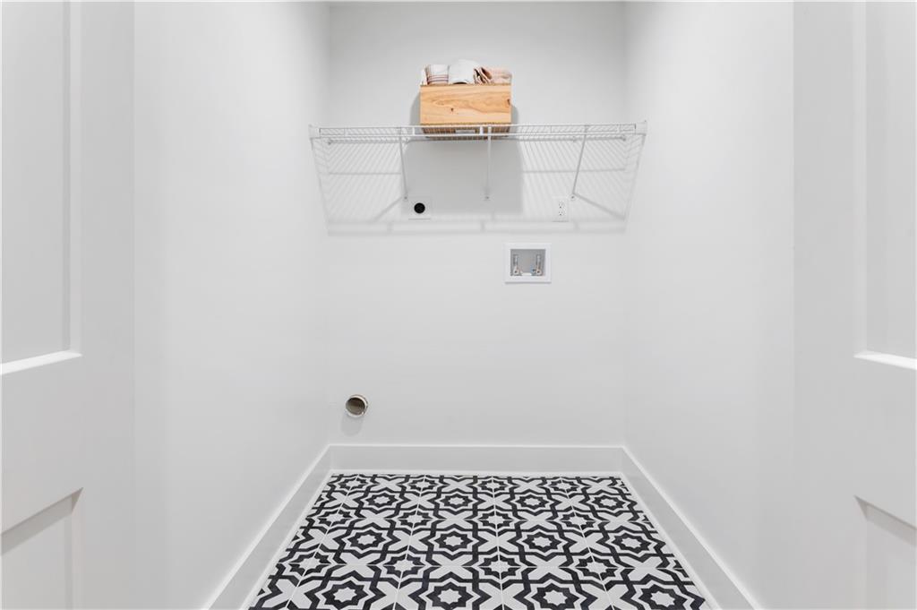 399 Old Canton Road Marietta, GA 30068 - Photo 22 of 26 a bathroom with a window