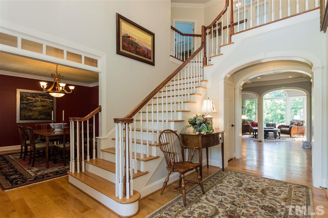 301 Pond Bluff Way Cary, NC 27513 - Photo 3 of 25 a view of entryway livingroom and hall with wooden floor