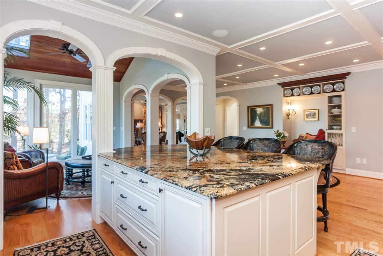 301 Pond Bluff Way Cary, NC 27513 - Photo 8 of 25 a view of living room with granite countertop chairs and rug