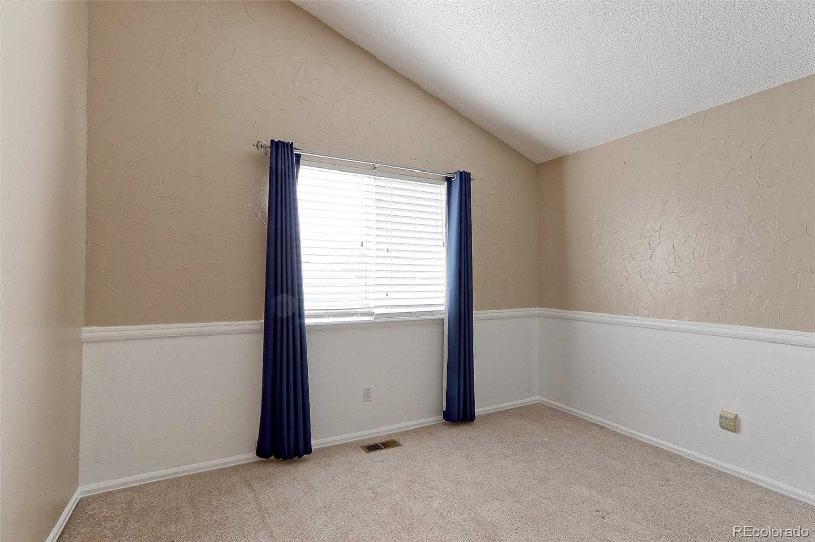 9068 West 101st Avenue Broomfield, CO 80021 - Photo 19 of 34 an empty room with a window