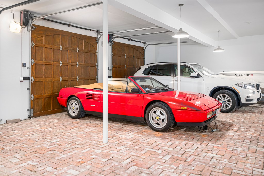 256 East Shore Road Jamestown, RI 02835 - Photo 25 of 40 3 CAR GARAGE WITH ONE TANDEM STALL THAT CAN FIT 2 CARS OR EXTRA SPACE FOR A BOAT