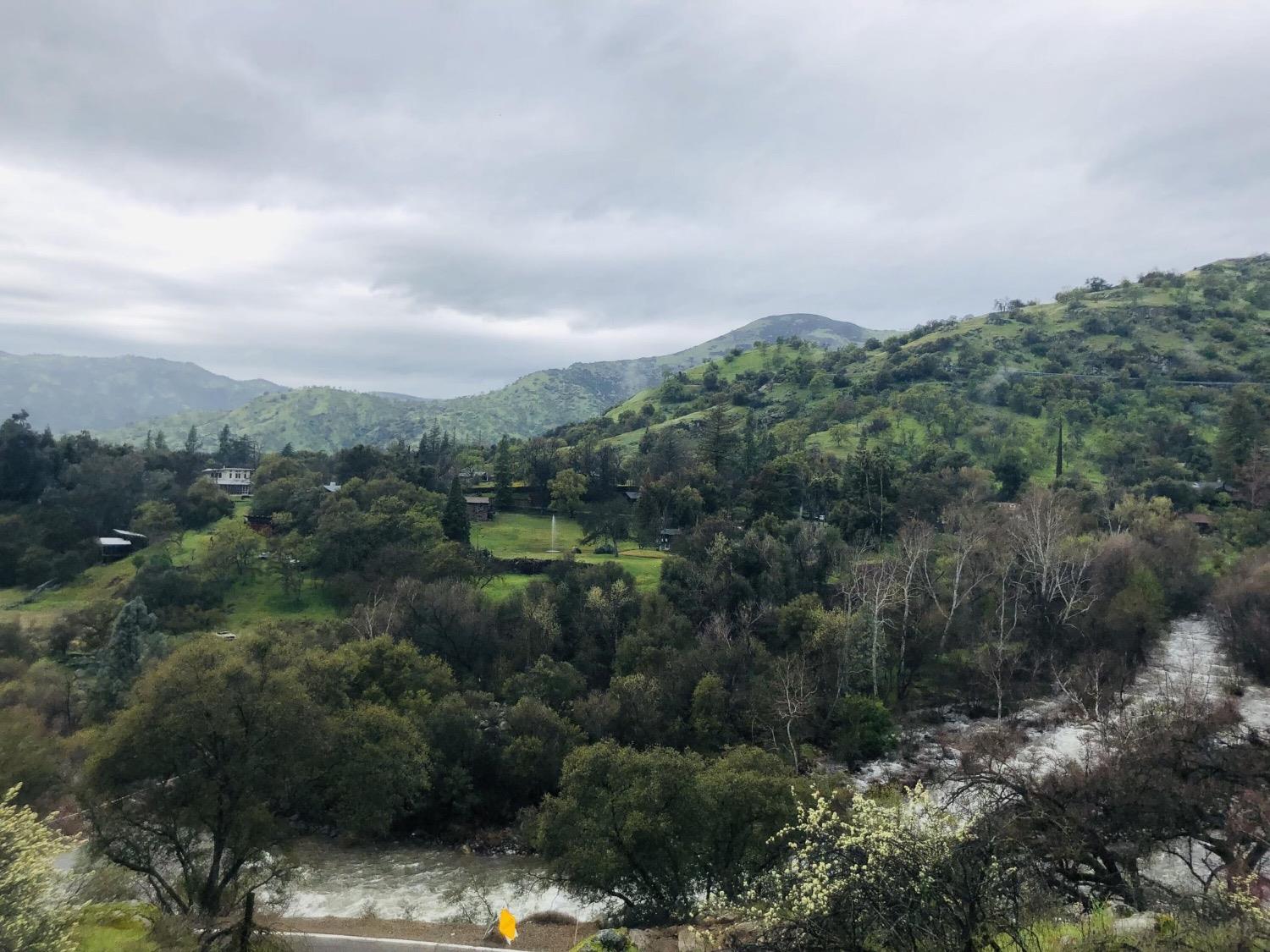 369 August Drive Three Rivers, CA 93271 - Photo 5 of 12 a view of a city with lush green forest