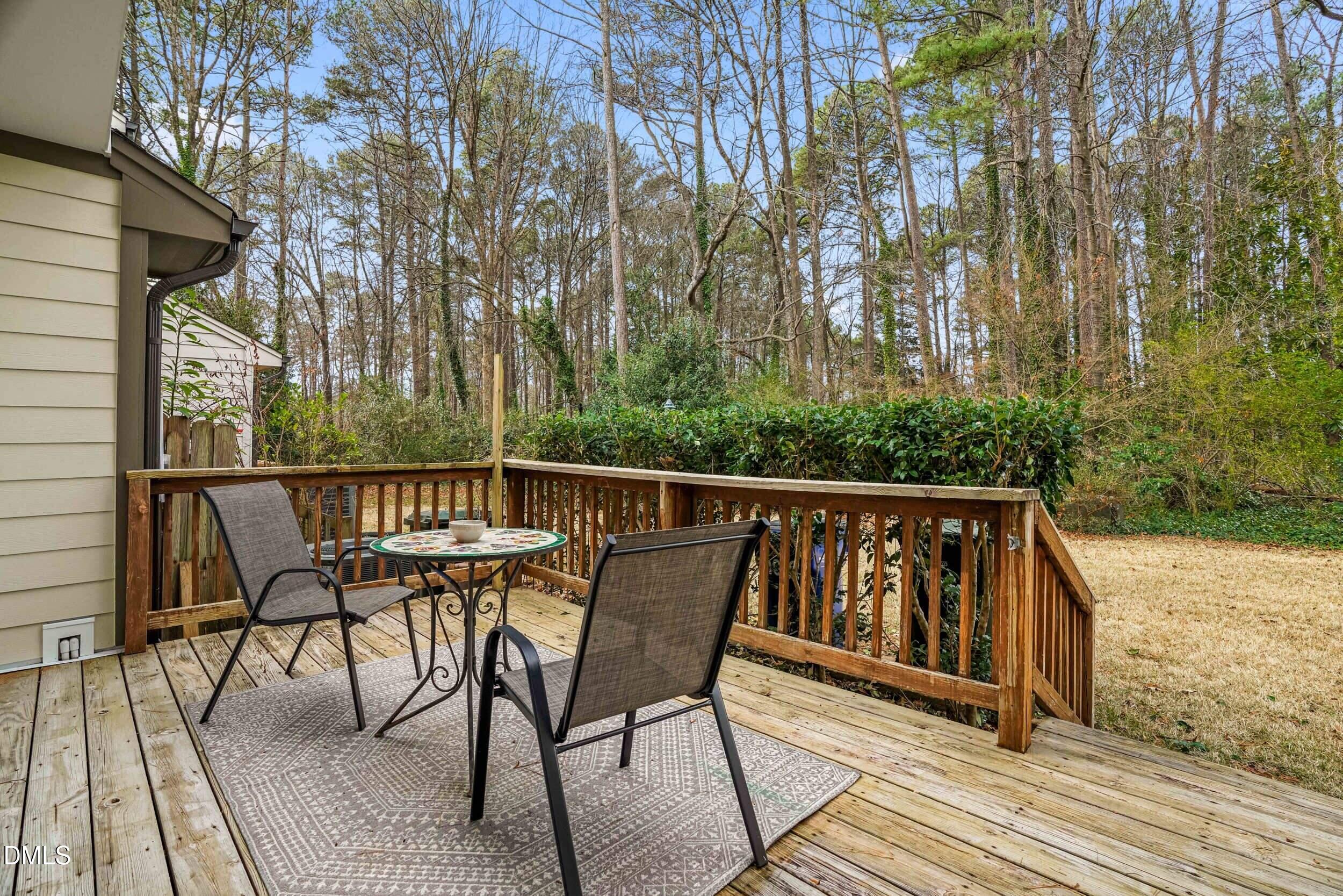 710 Powell Drive, Unit C Raleigh, NC 27606 - Photo 22 of 24 a view of a two chairs on the roof deck