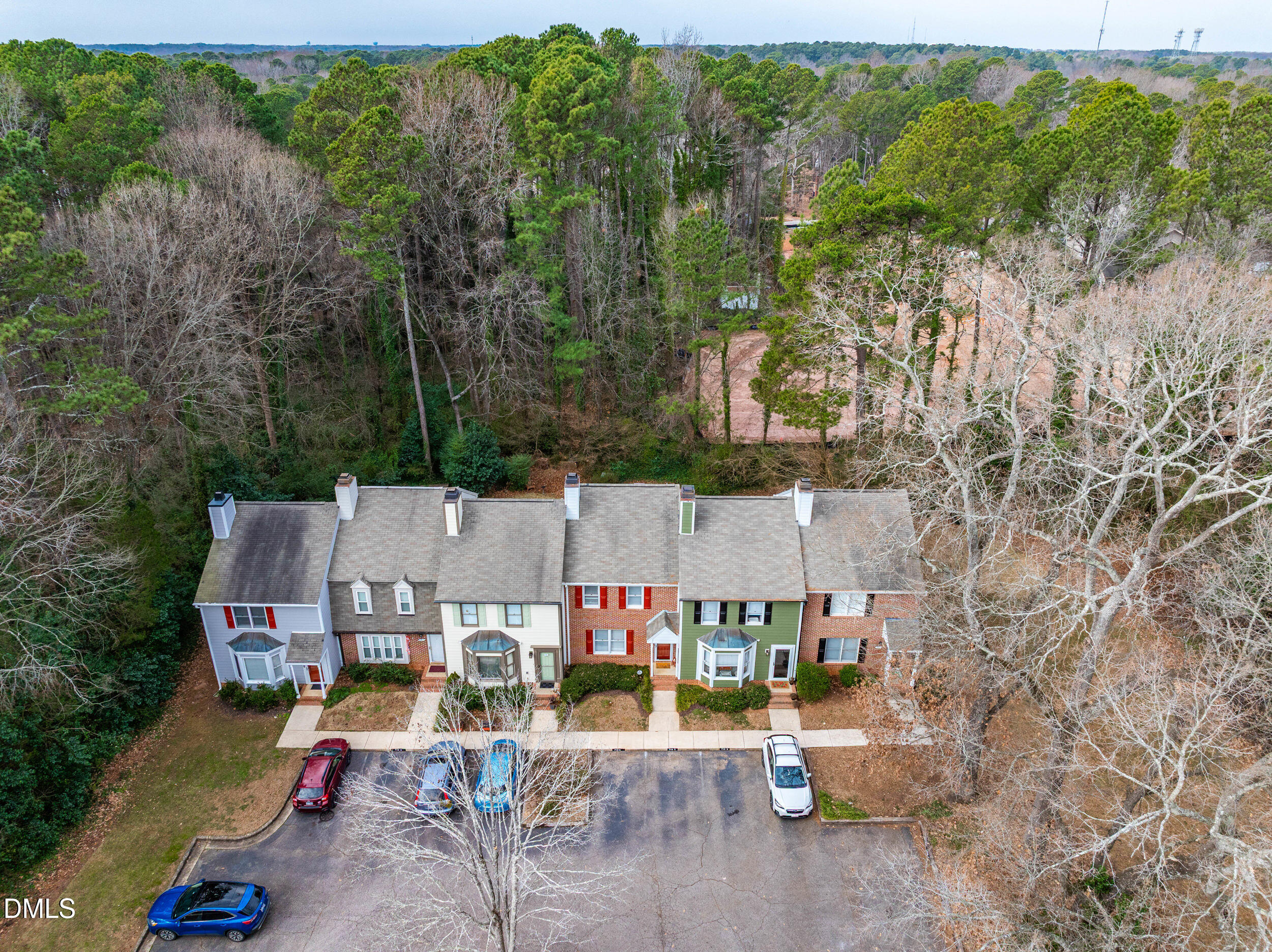 710 Powell Drive, Unit C Raleigh, NC 27606 - Photo 3 of 24 an aerial view of a house with a yard basket ball court and outdoor seating