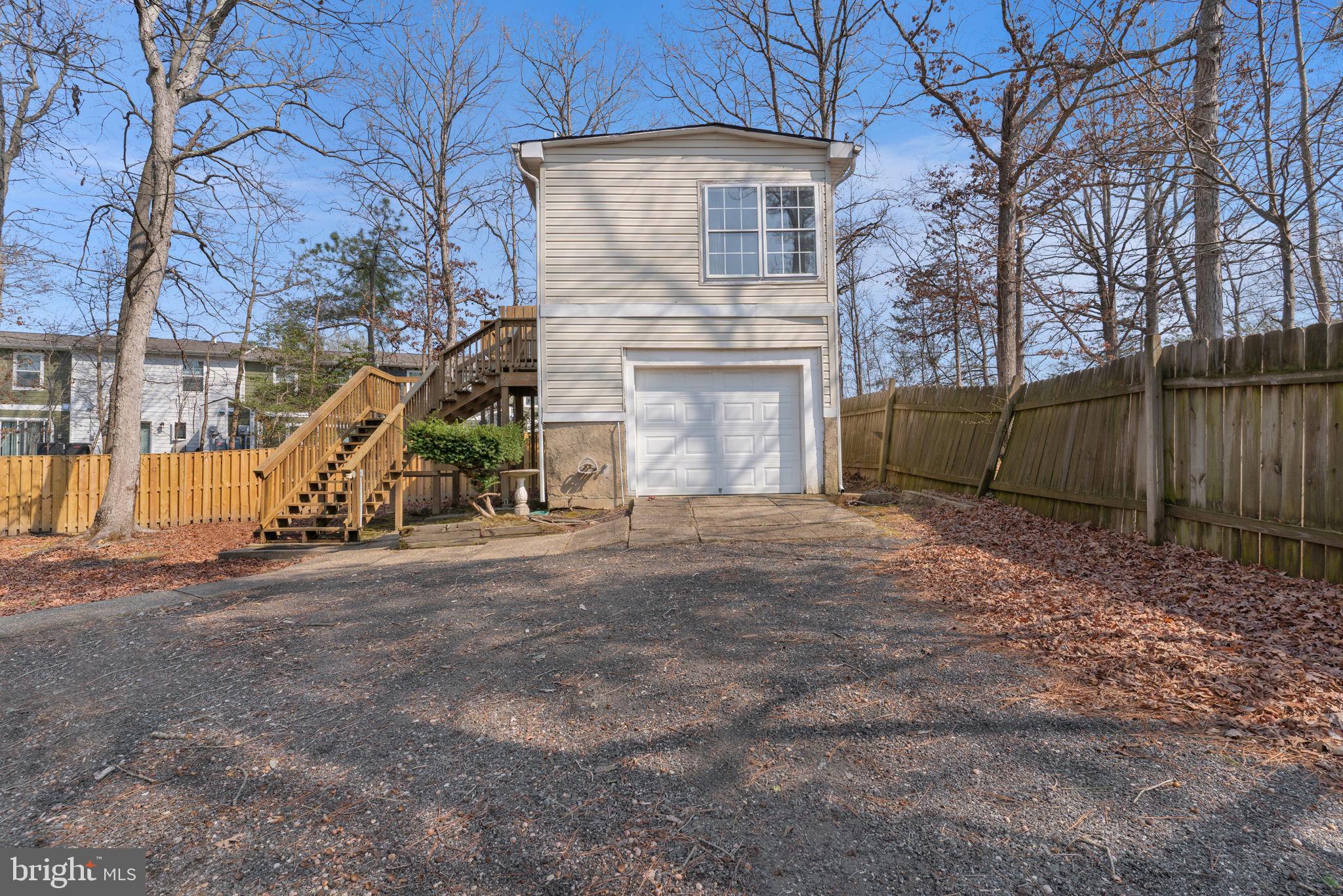 21996 Fox Ridge Road Lexington Park, MD 20653 - Photo 33 of 35 Stairs sealed and stained
