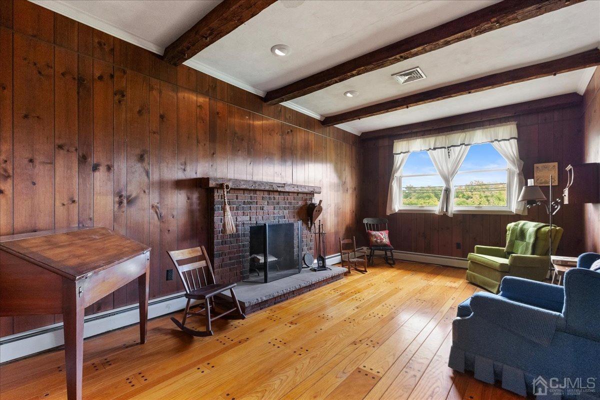 2142 South Branch Road Neshanic Station, NJ 08853 - Photo 15 of 48 a living room with furniture and a fireplace