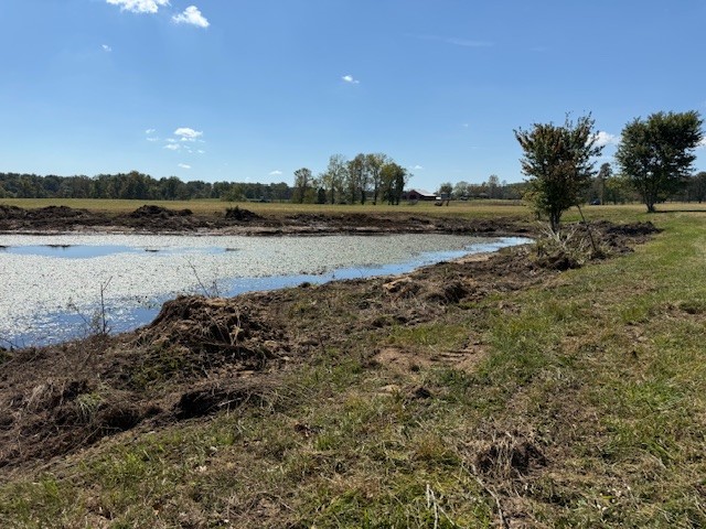 549 Virgil Smith Road Crossville, TN 38571 - Photo 22 of 26 a view of a lake from a yard