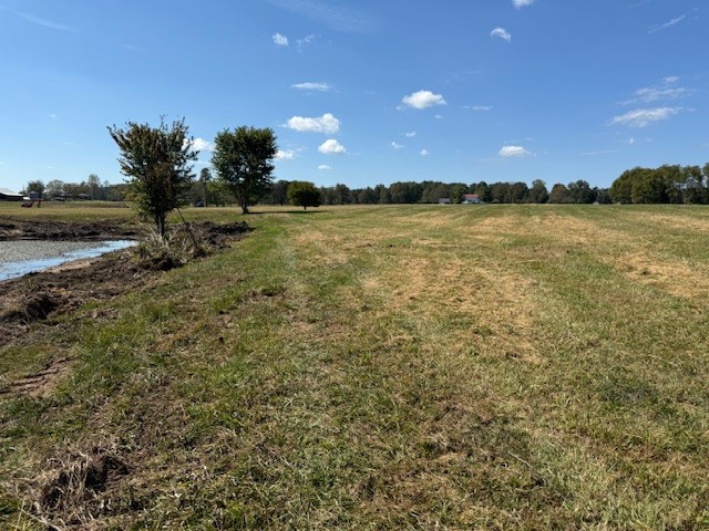 549 Virgil Smith Road Crossville, TN 38571 - Photo 23 of 26 a view of a lake with houses in the back