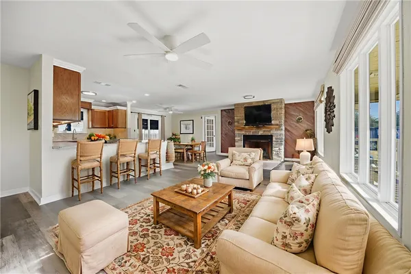 a view of a living room a fireplace with wooden floor