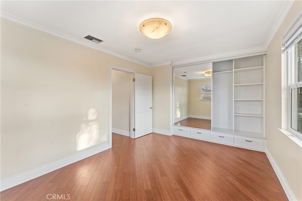 510 Lime Street Redlands, CA 92374 - Photo 23 of 50 a view of an empty room with wooden floor