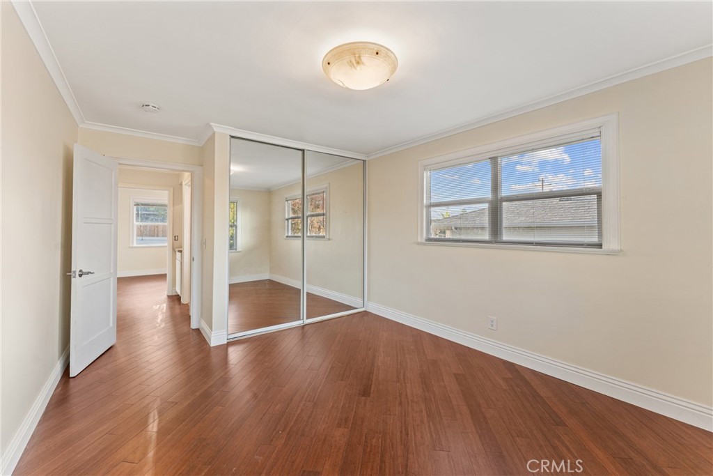 510 Lime Street Redlands, CA 92374 - Photo 25 of 50 an empty room with wooden floor and windows