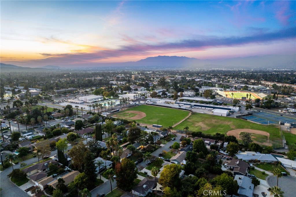 510 Lime Street Redlands, CA 92374 - Photo 41 of 50 an aerial view of residential houses with outdoor space and swimming pool