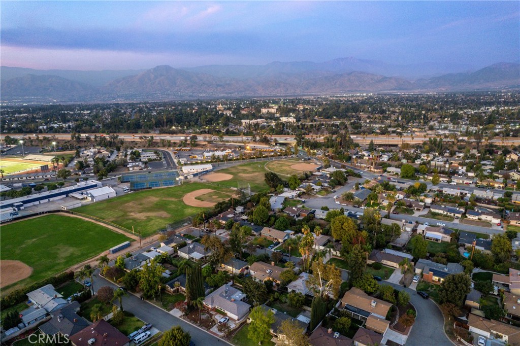 510 Lime Street Redlands, CA 92374 - Photo 42 of 50 an aerial view of a residential houses with outdoor space and trees