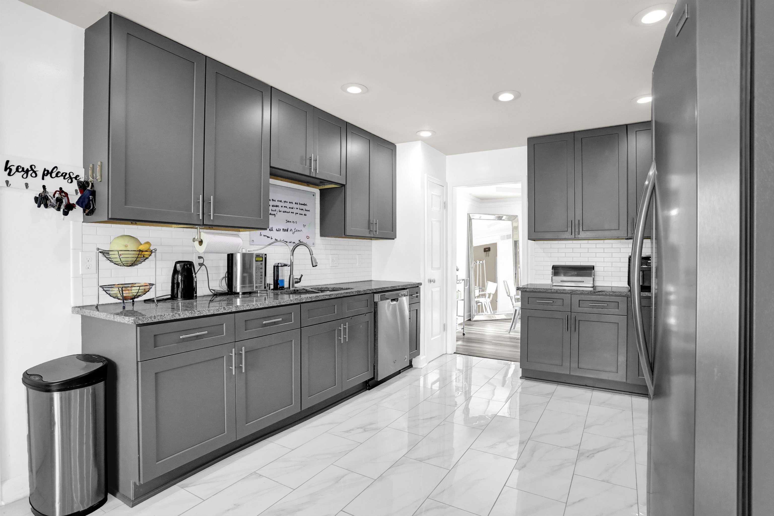 4045 Bartlett Country Road Bartlett, TN 38135 - Photo 14 of 40 a large kitchen with cabinets and steel stainless steel appliances