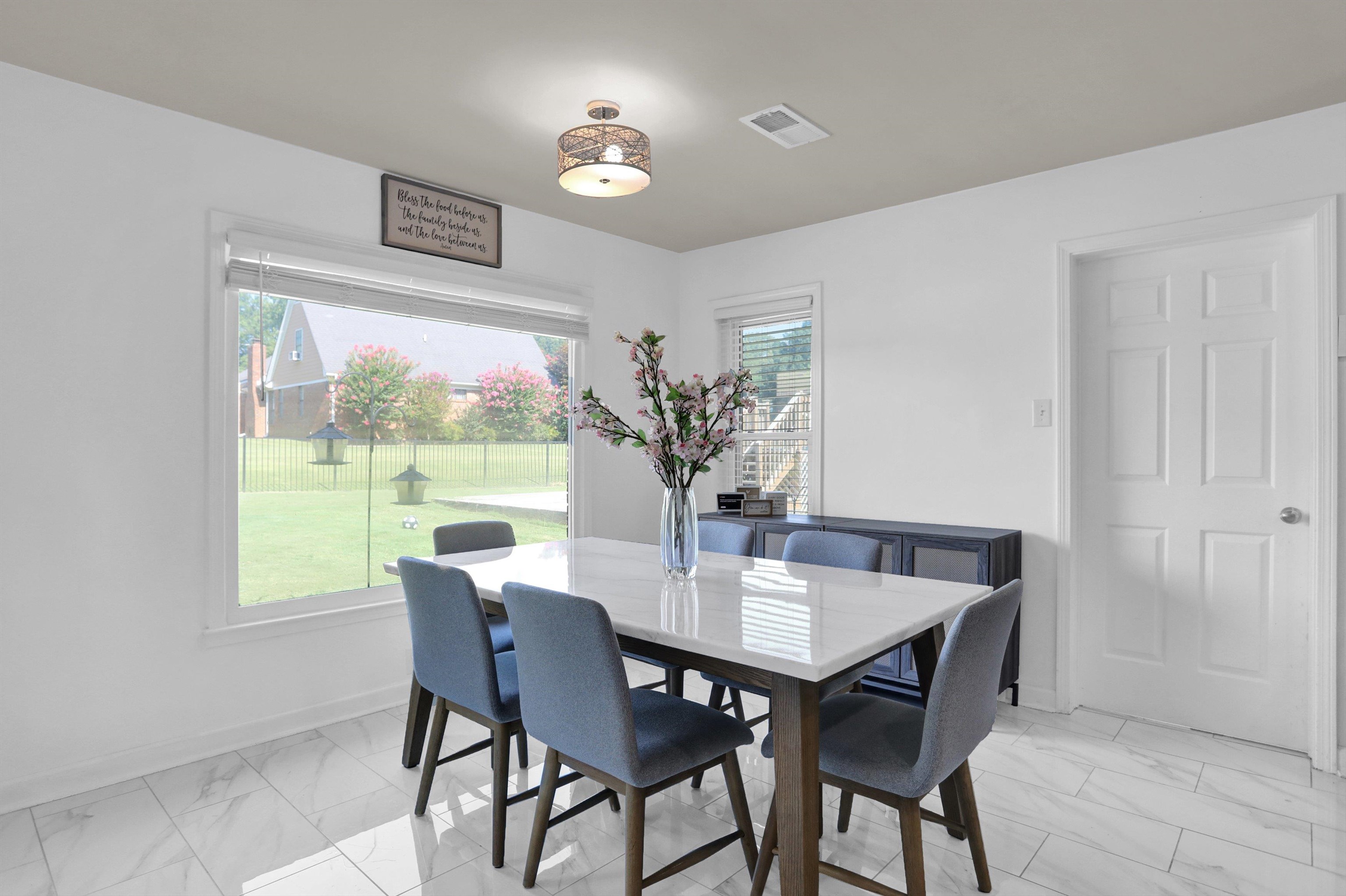 4045 Bartlett Country Road Bartlett, TN 38135 - Photo 17 of 40 a view of a dining room with furniture window and outside view
