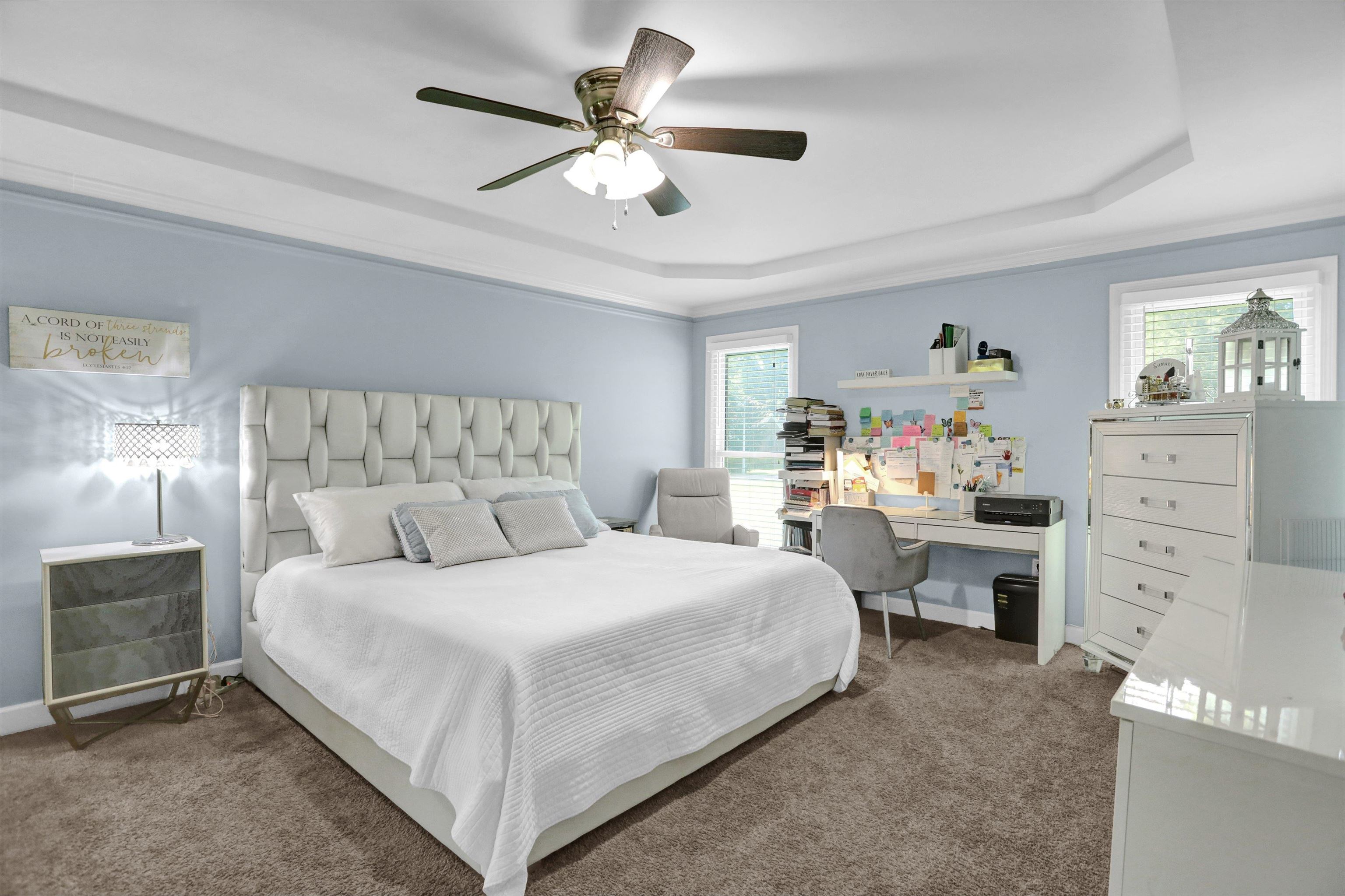 4045 Bartlett Country Road Bartlett, TN 38135 - Photo 3 of 40 a bedroom with a bed and a chandelier