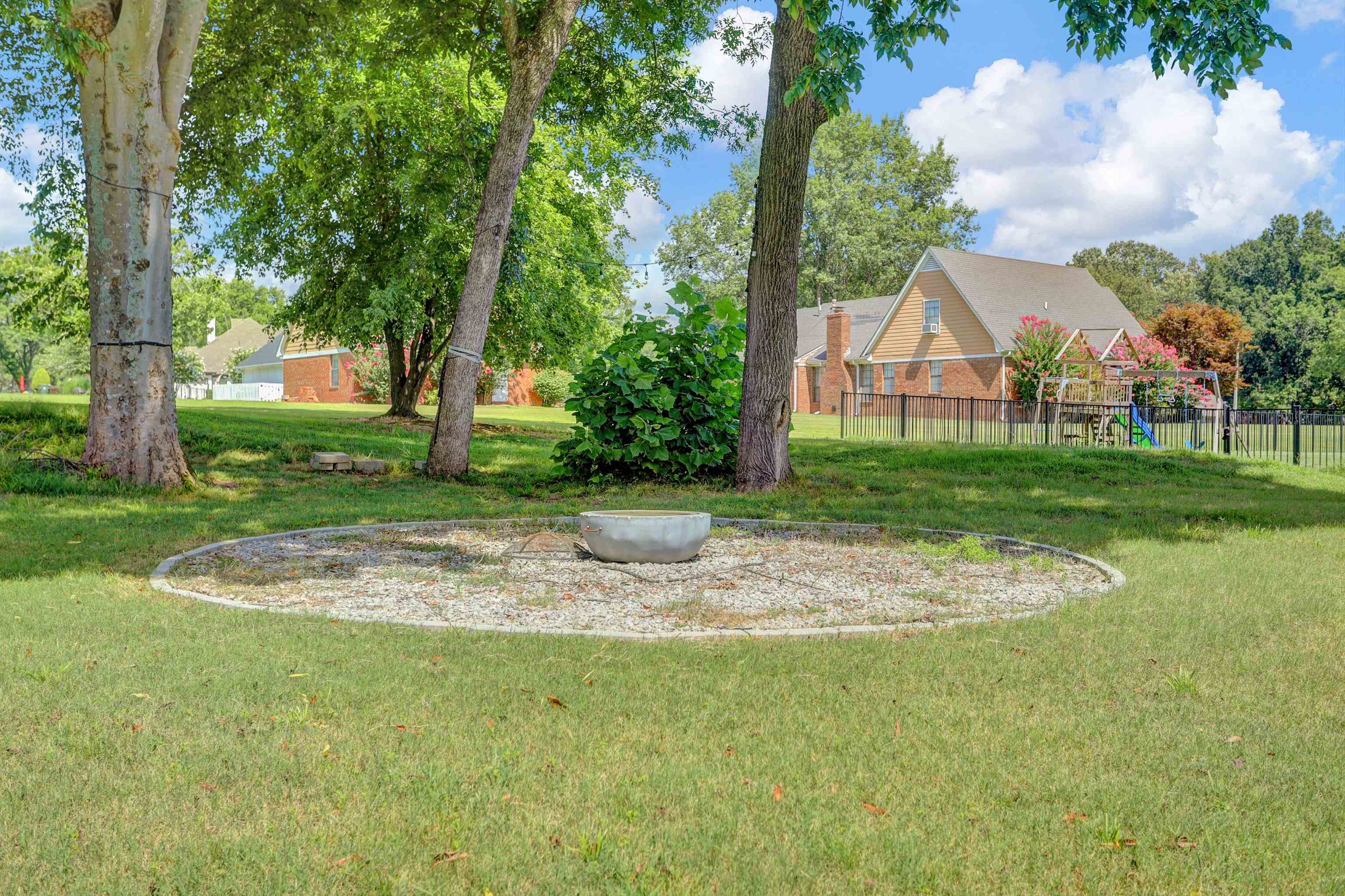 4045 Bartlett Country Road Bartlett, TN 38135 - Photo 32 of 40 a view of a out door of the house along with trees