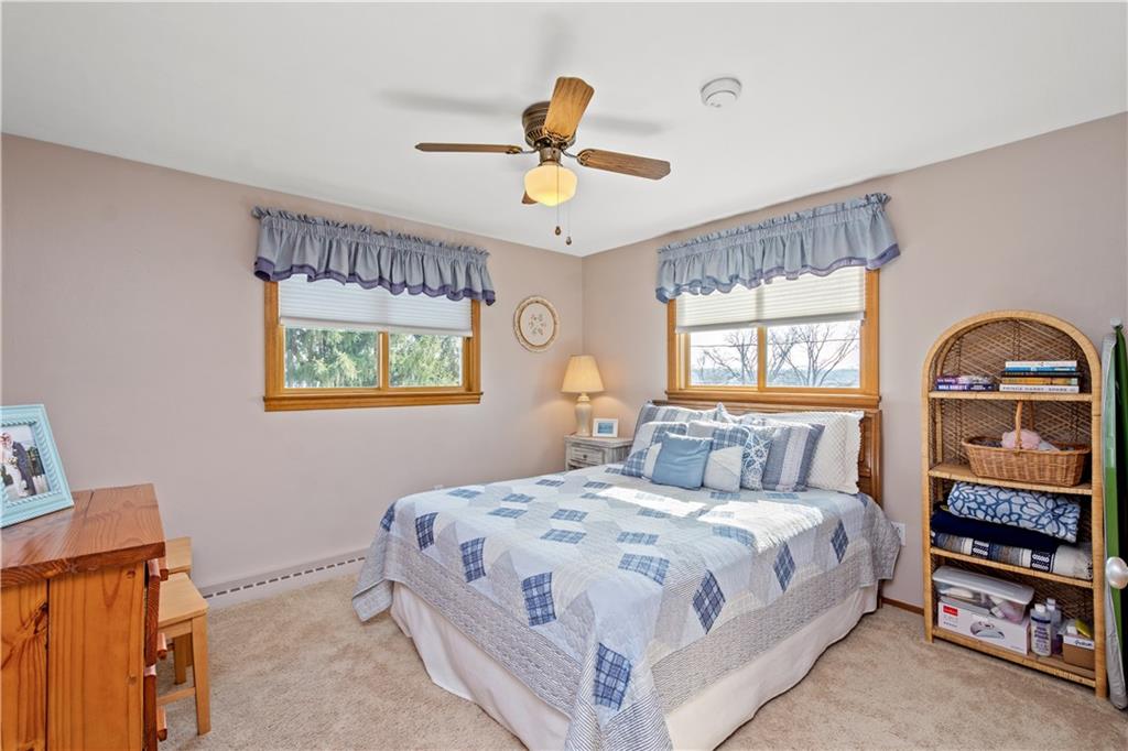 1735 Borland Road Pittsburgh, PA 15243 - Photo 13 of 25 a bedroom with a bed a window and painting on the wall
