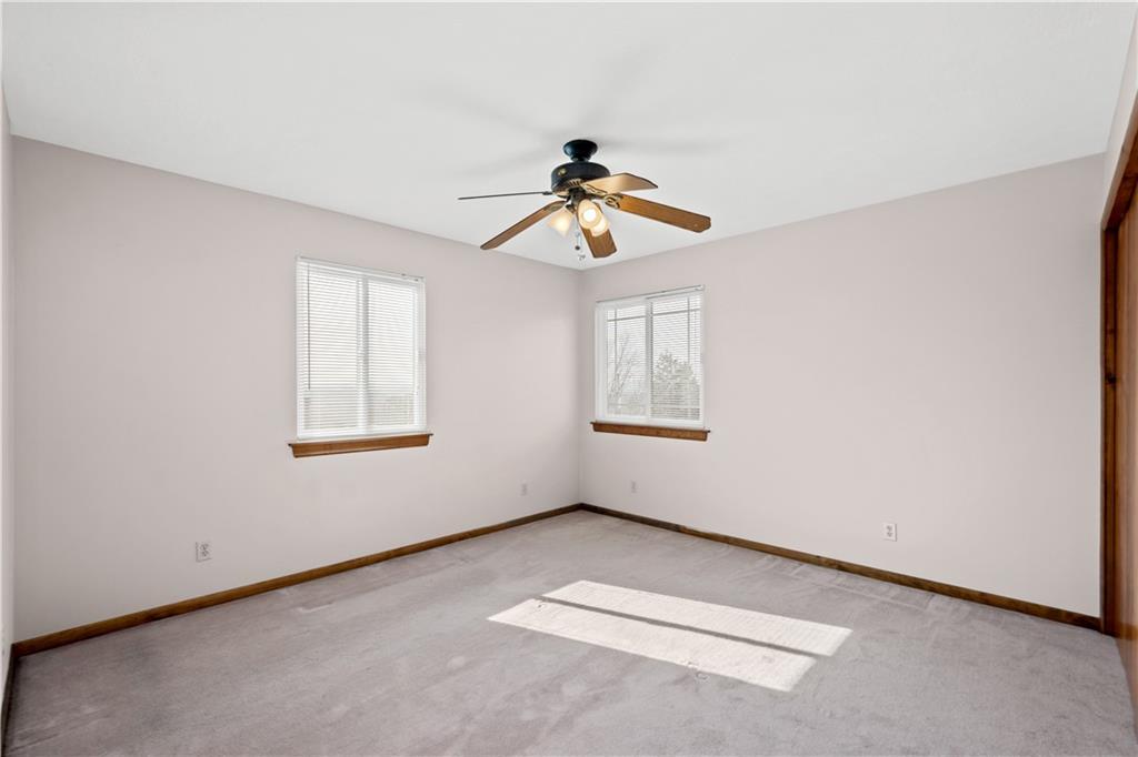 1735 Borland Road Pittsburgh, PA 15243 - Photo 18 of 25 an empty room with windows and chandelier fan