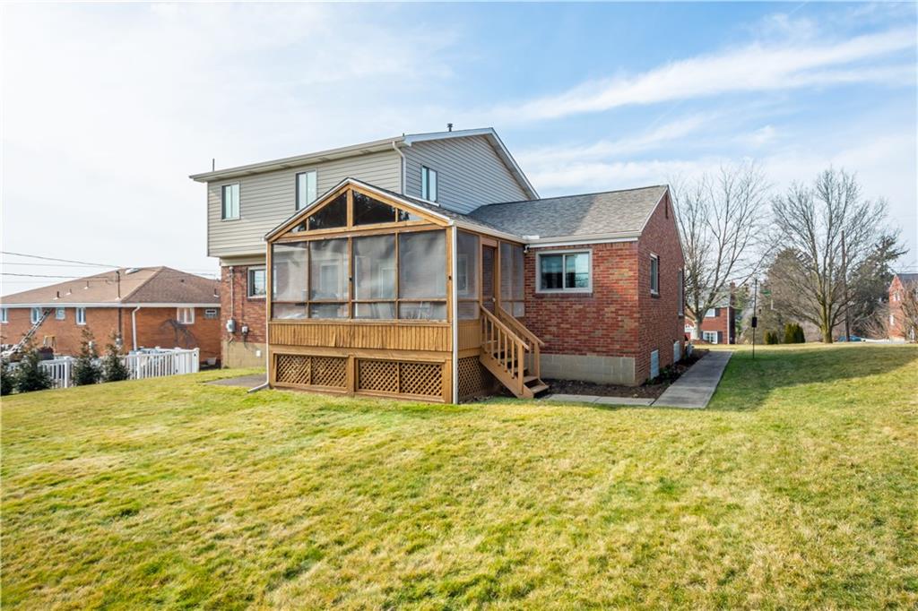 1735 Borland Road Pittsburgh, PA 15243 - Photo 22 of 25 a view of a house with a yard and sitting area