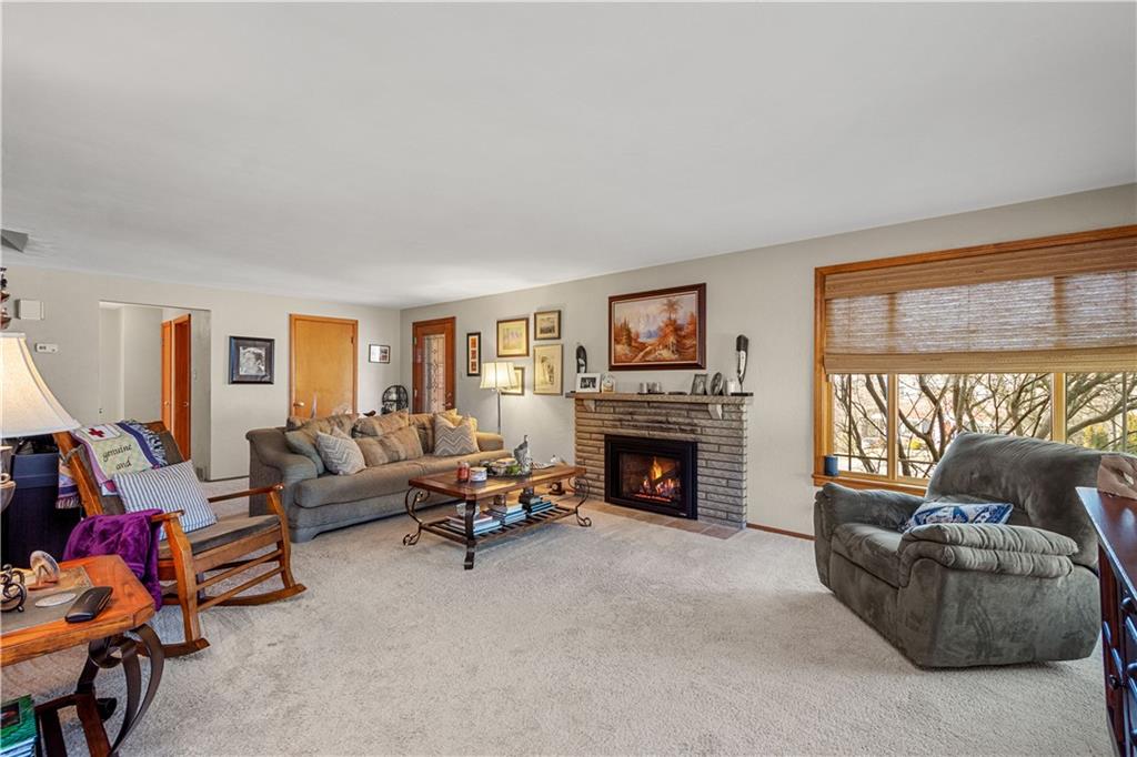 1735 Borland Road Pittsburgh, PA 15243 - Photo 4 of 25 a living room with furniture and a fireplace