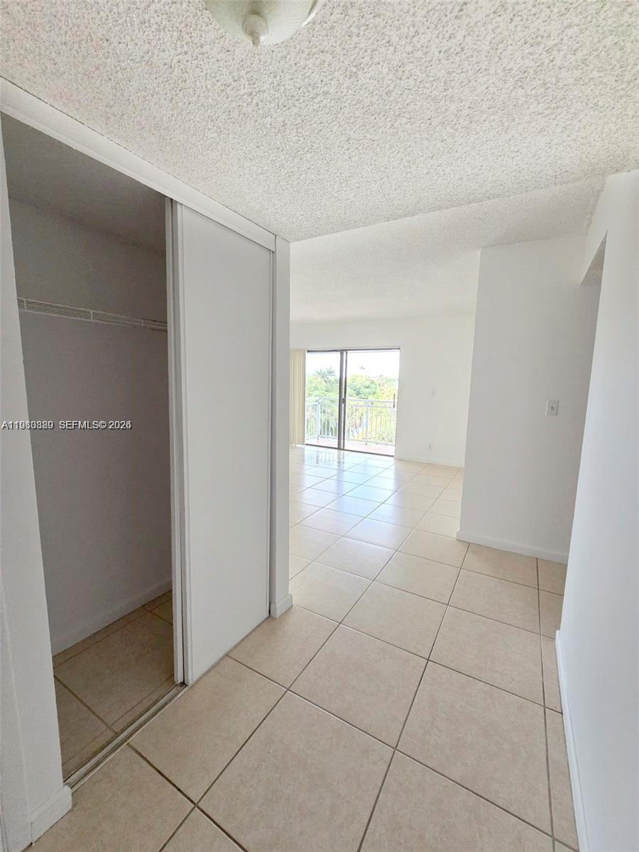 505 South Pine Island Road, Unit 401B Plantation, FL 33324 - Photo 2 of 15 an empty room with windows