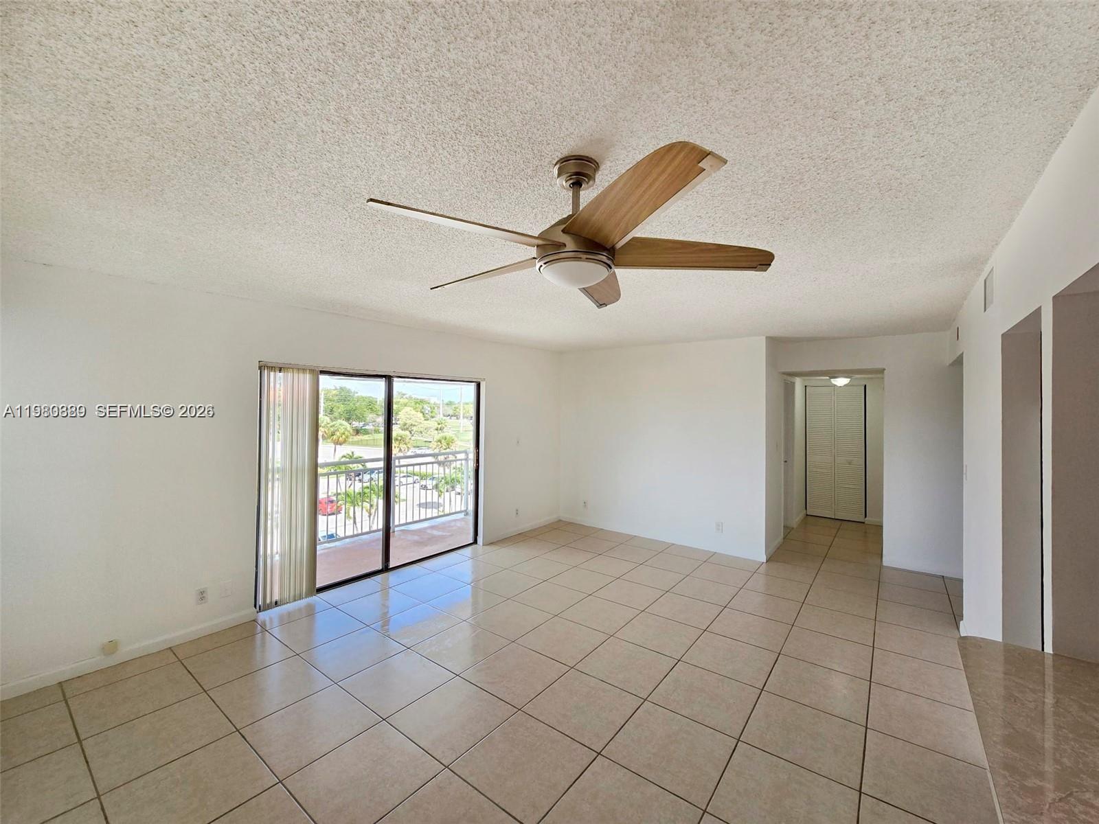 505 South Pine Island Road, Unit 401B Plantation, FL 33324 - Photo 5 of 15 an empty room with windows and closet