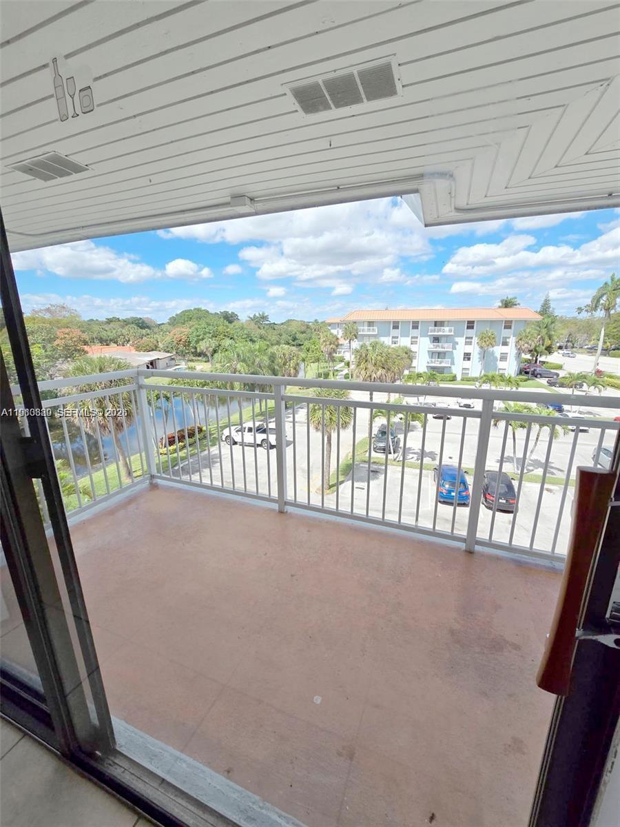505 South Pine Island Road, Unit 401B Plantation, FL 33324 - Photo 9 of 15 a view of balcony with city and ocean view