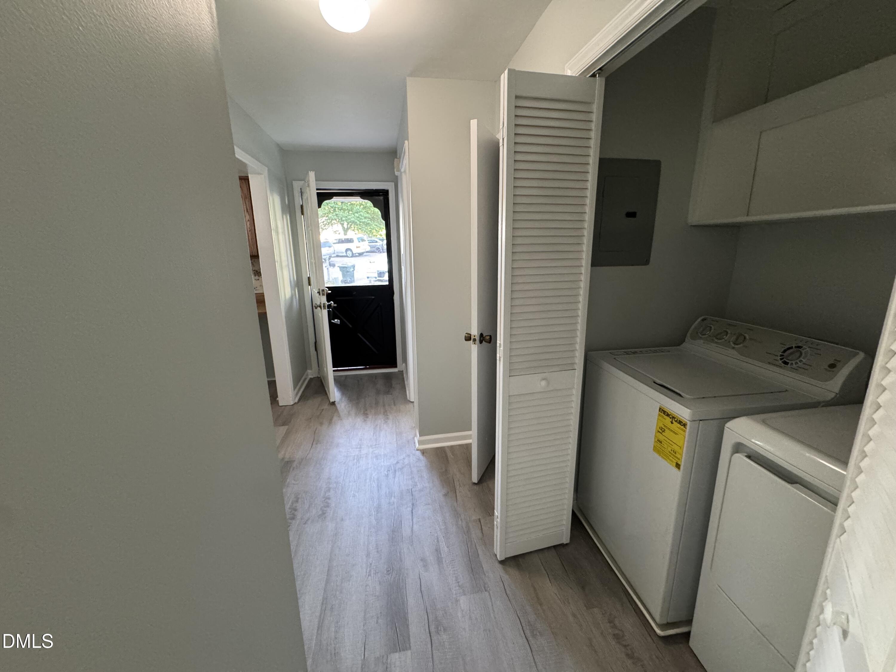 4200 Bertram Drive Raleigh, NC 27604 - Photo 7 of 16 a view of hallway with wooden floor and stairs