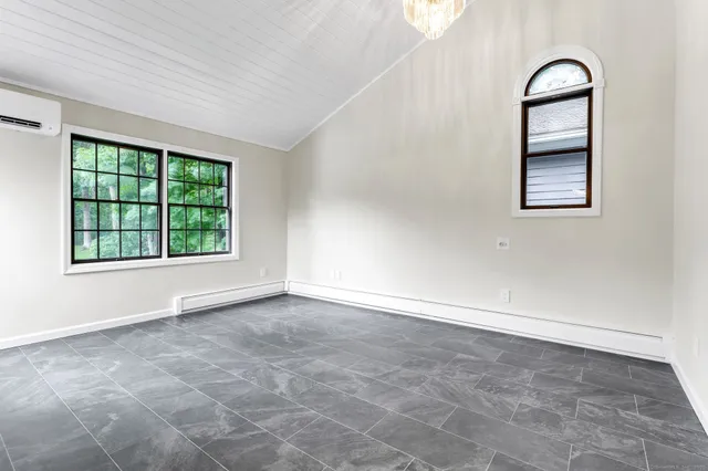 an empty room with windows