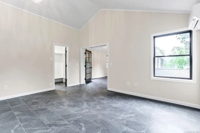 an empty room with windows