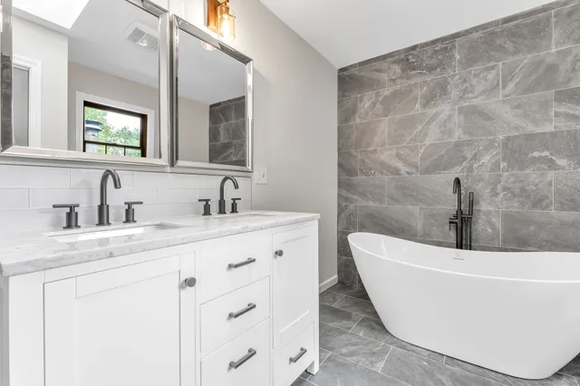 a bathroom with a sink and a bathtub