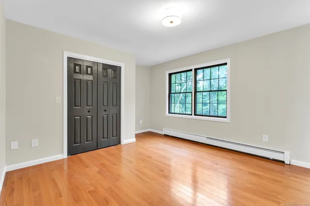 an empty room with large window