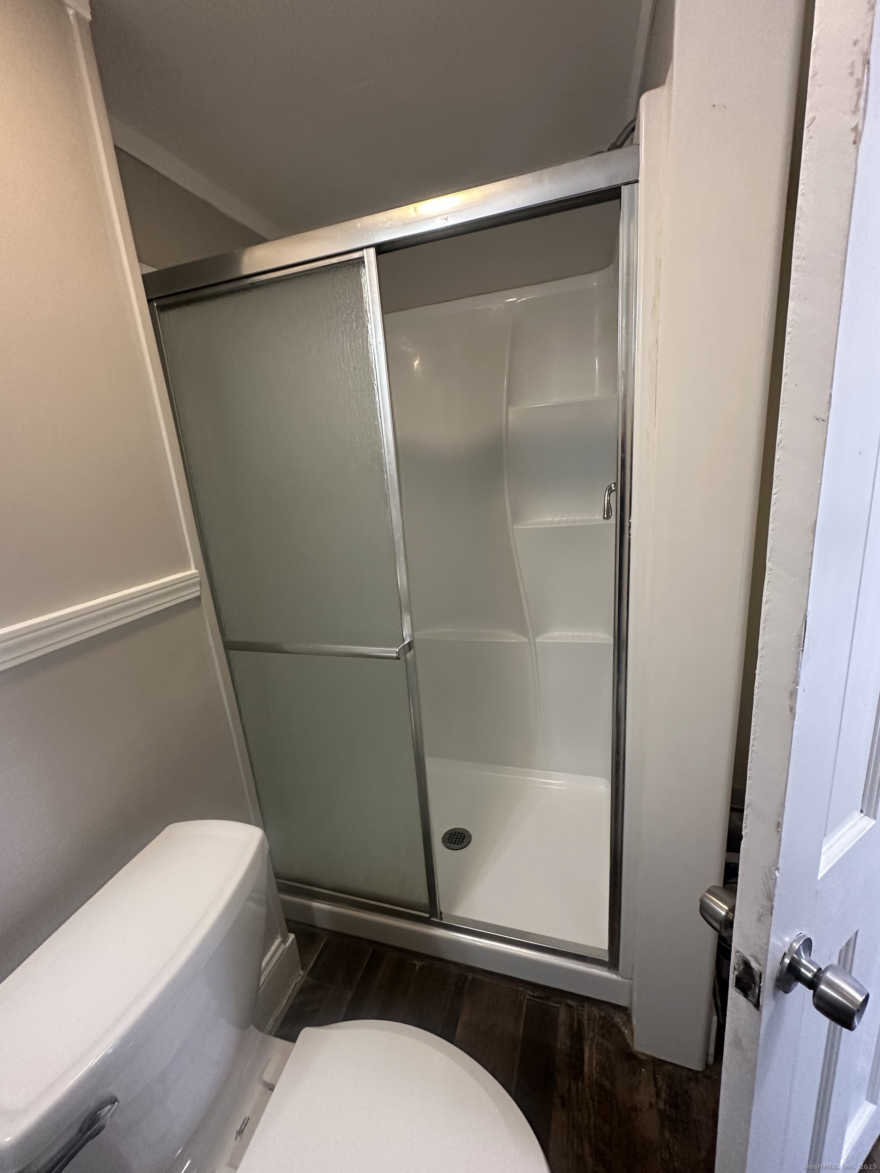 16 Lake Street, Unit 2W Middletown, CT 06457 - Photo 11 of 15 a bathroom with a toilet and a shower