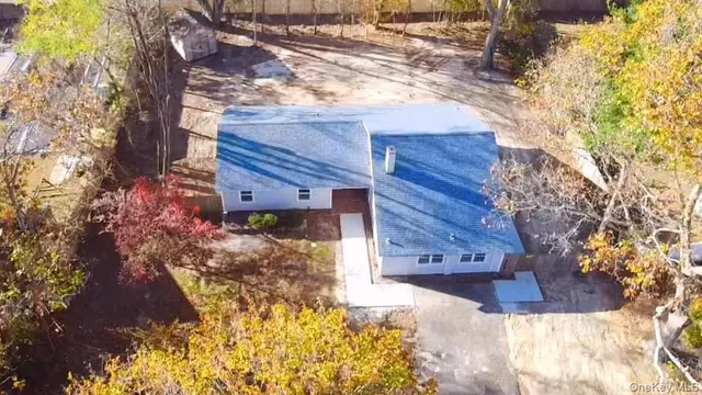 a view of a backyard of a house