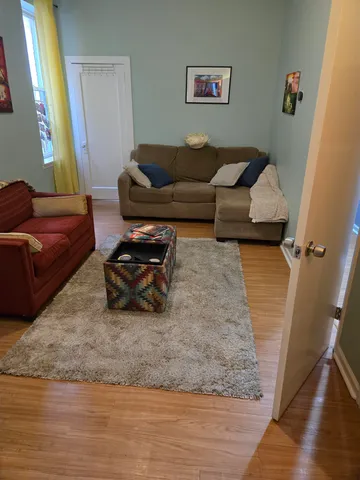 a living room with furniture and a couch
