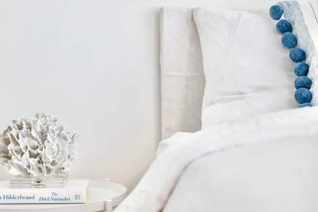 a house view with a seating space and garden