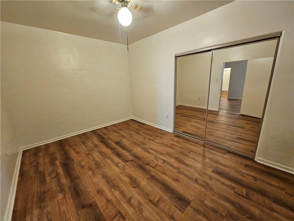944 4th Avenue, Unit 4 Coraopolis, PA 15108 - Photo 6 of 6 a view of a room with wooden floor and white walls