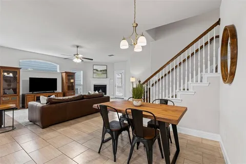 a kitchen with stainless steel appliances granite countertop a refrigerator oven a sink and dishwasher